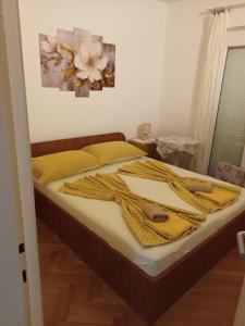 Posteľ alebo postele v izbe v ubytovaní Apartments Marija Sabina