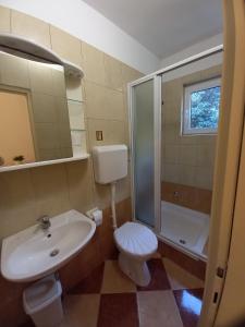 Kúpeľňa v ubytovaní Apartments Marija Sabina