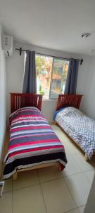 Ένα ή περισσότερα κρεβάτια σε δωμάτιο στο Apartment Xochimilco