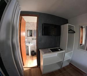 TV a/nebo společenská místnost v ubytování Container Hospedaria Paraty