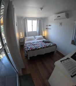 Postel nebo postele na pokoji v ubytování Container Hospedaria Paraty