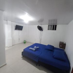 Apartamentos privados y habitaciones individuales en el centroにあるベッド