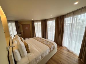 Voodi või voodid majutusasutuse APATOA Beach & Garden Village toas