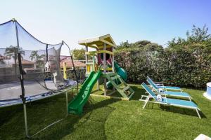 Kawasan permainan kanak-kanak di Spacious House with Pool in Lomas de Cocoyoc 3 Bedrooms