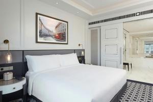 Voodi või voodid majutusasutuse Londoner Grand, a Luxury Collection Hotel, Macau toas