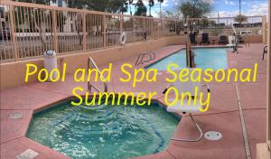 a pool and spa seasonal summer only at a resort at Baymont by Wyndham Tucson Airport in Tucson