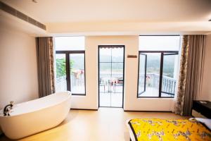 Llit o llits en una habitació de Xiyuyanyiyu B&B