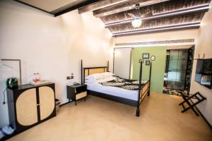 Llit o llits en una habitació de Xiyuyanyiyu B&B