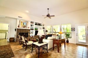 a living room with a couch and a fireplace at Rancho Manana Private Home - C8912 in Cave Creek +24 photos