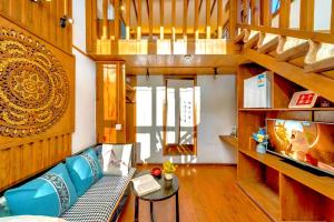 Χώρος καθιστικού στο Quiet Garden Inn Lijiang Old Town Branch
