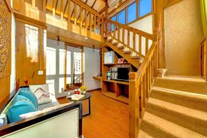Χώρος καθιστικού στο Quiet Garden Inn Lijiang Old Town Branch