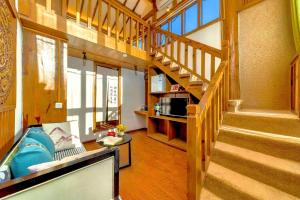 Χώρος καθιστικού στο Quiet Garden Inn Lijiang Old Town Branch