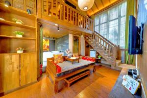 Χώρος καθιστικού στο Quiet Garden Inn Lijiang Old Town Branch