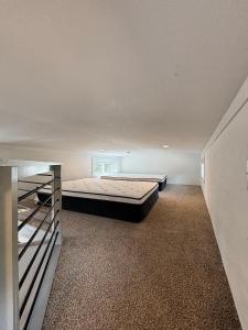 a large bedroom with a large bed in it at Yogi Bear's Jellystone Park Camp-Resort in Estes Park in Estes Park