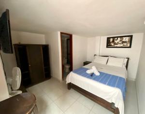 Hotel Davilejas客房内的一张或多张床位