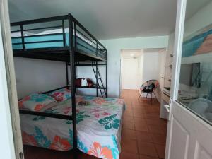 Postel nebo postele na pokoji v ubytování Ti Mabouya Appartement Saint François