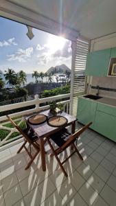 Balkón nebo terasa v ubytování Ti Dyaman - Studio vue mer & accès piscine gratuit