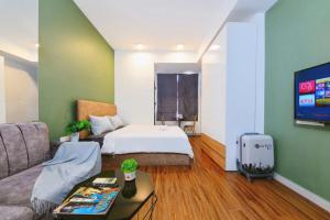 Apartment Luxury - Infinity Pool by Center City客房内的一张或多张床位
