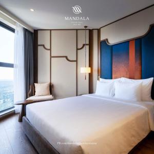 Wins House - Suite Panorama Grand客房内的一张或多张床位