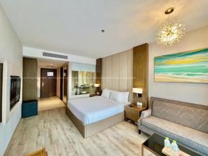 Wins House - Suite Panorama Grand客房内的一张或多张床位