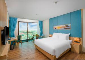 Wins House - Suite Panorama Grand客房内的一张或多张床位