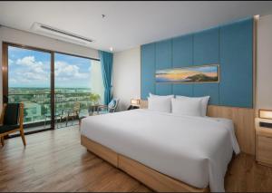 Wins House - Suite Panorama Grand客房内的一张或多张床位