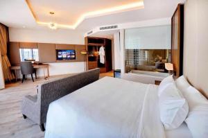 Wins House - Suite Panorama Grand客房内的一张或多张床位