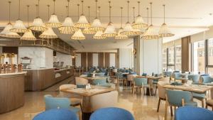 Wins House - Suite Panorama Grand餐厅或其他用餐的地方