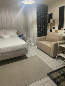 Postel nebo postele na pokoji v ubytování Boricua 3 Studio Apt C Air Conditioning Wi Fi