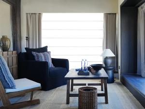 Lijiang Liuji Rizhao Jinshan View Guesthouse的休息区