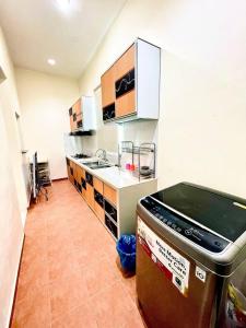 Φωτογραφία από το άλμπουμ του Anis Homestay 5 bedrooms 5 bathrooms σε Alor Setar