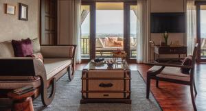 Ruang duduk di Anantara Golden Triangle Elephant Camp & Resort