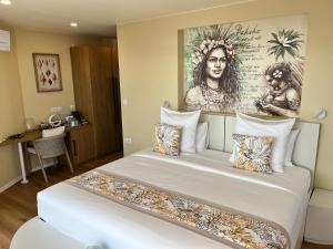 Voodi või voodid majutusasutuse APATOA Beach & Garden Village toas
