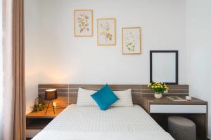 Postel nebo postele na pokoji v ubytování La Cle' Đà Lạt