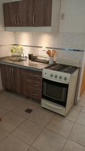 Køkken eller tekøkken på Dpto Cabildo temporario con cochera incluida + 7 billeder