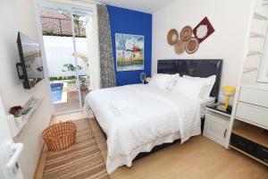 Gambar di galeri bagi Casa Indigo - KBP with swimming pool, large kitchen and dining area, near Whoosh Station di Padalarang