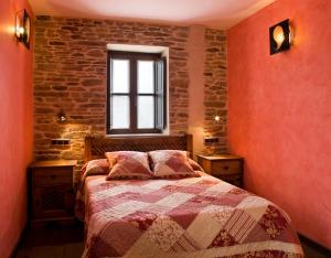 Postel nebo postele na pokoji v ubytování Hostal Raices