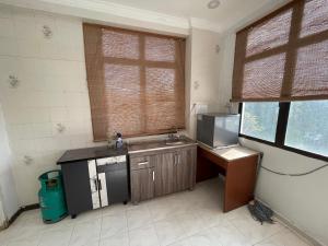 Kuchyň nebo kuchyňský kout v ubytování EasyStay Langkawi Apartment