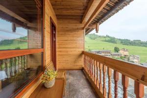 Balkón nebo terasa v ubytování Longji Yijingyuan Hotel + 4 fotografie
