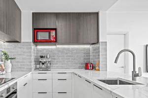 O bucătărie sau chicinetă la Heart of the City Apartment - By Sky Tower - Free Parking!