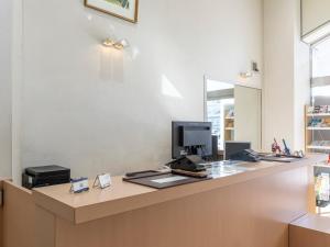 TV a/nebo společenská místnost v ubytování Kochi Terminal Hotel