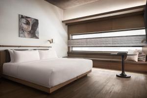 Postel nebo postele na pokoji v ubytování Hotel KVL