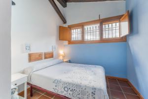 Ένα ή περισσότερα κρεβάτια σε δωμάτιο στο EL MOLINO De Villel