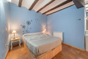 Ένα ή περισσότερα κρεβάτια σε δωμάτιο στο EL MOLINO De Villel