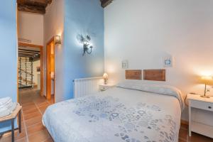 Ένα ή περισσότερα κρεβάτια σε δωμάτιο στο EL MOLINO De Villel