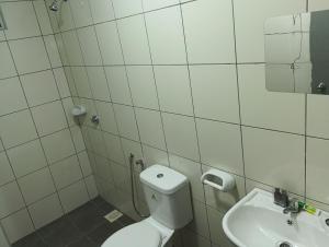 a bathroom with a toilet and a sink at mazya homestay in Malacca +61 photos
