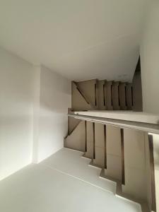 Voodi või voodid majutusasutuse Hermosa habitación a una cuadra del Ventura Plaza 3 toas