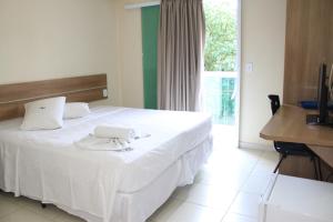 Lova arba lovos apgyvendinimo įstaigoje Hotel do Farol