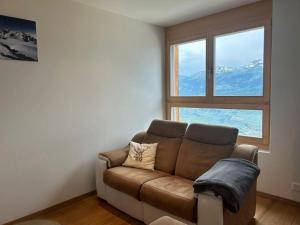 Posezení v ubytování Apartment in Veysonnaz near Ski Lift