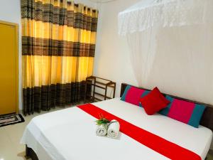 Letto o letti in una camera di Pawana Rest